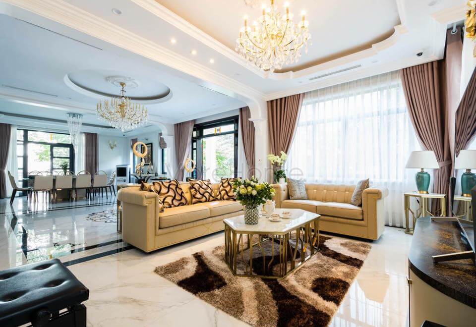 Bộ sofa phòng khách được làm từ gỗ tự nhiên bọc da vô cùng sang trọng và đẳng cấp Mẫu nội thất biệt thự tân cổ điển đẹp
